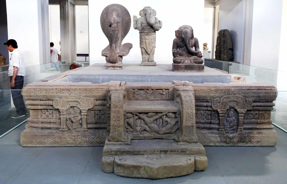 The My Son E1 Altar captures Vishnu reclining on the serpent Shesha,an iconic masterpiece of Cham spiritual art 